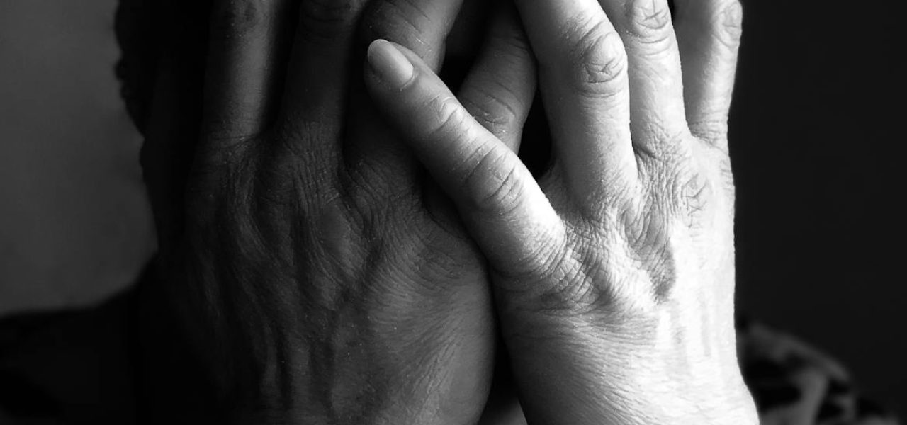 extreme close up of a woman covering her face